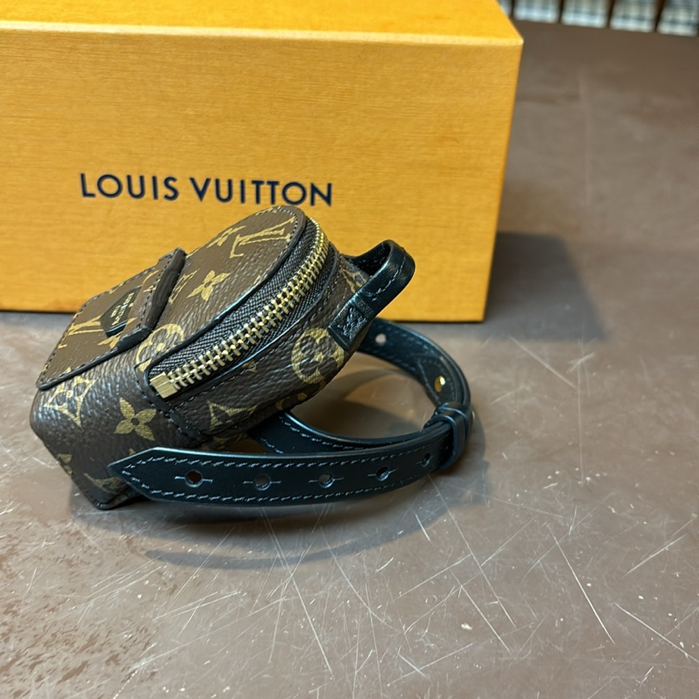 Authentic Louis Vuitton Party bracelet. Worn on wrist or attached to  handbag.